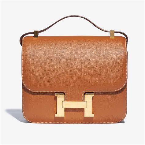 hermes constance 24 gold|Hermes constance price guide.